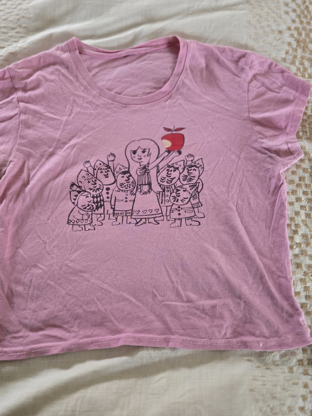 Vintage Pink Graphic Tee with Red Apple Detail